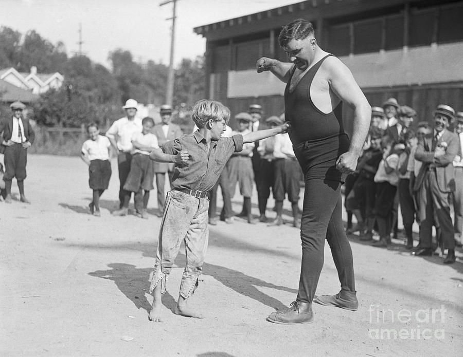 Boy Punches Jess Willards Stomach Photograph by Bettmann