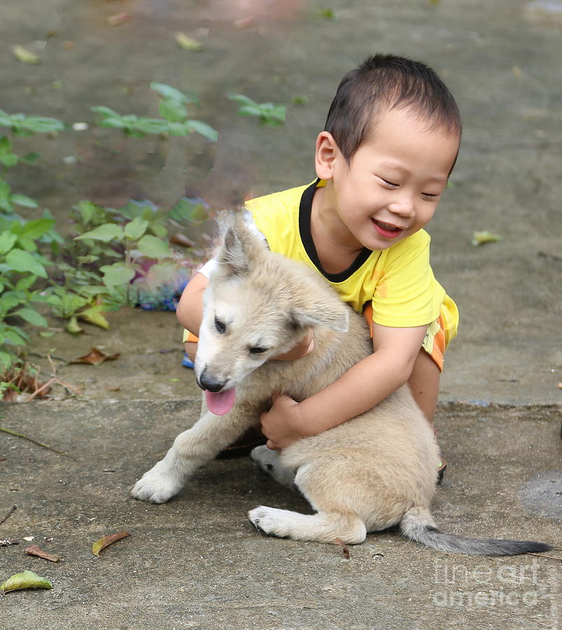 Boy Puppy Love  Photograph by Chuck Kuhn