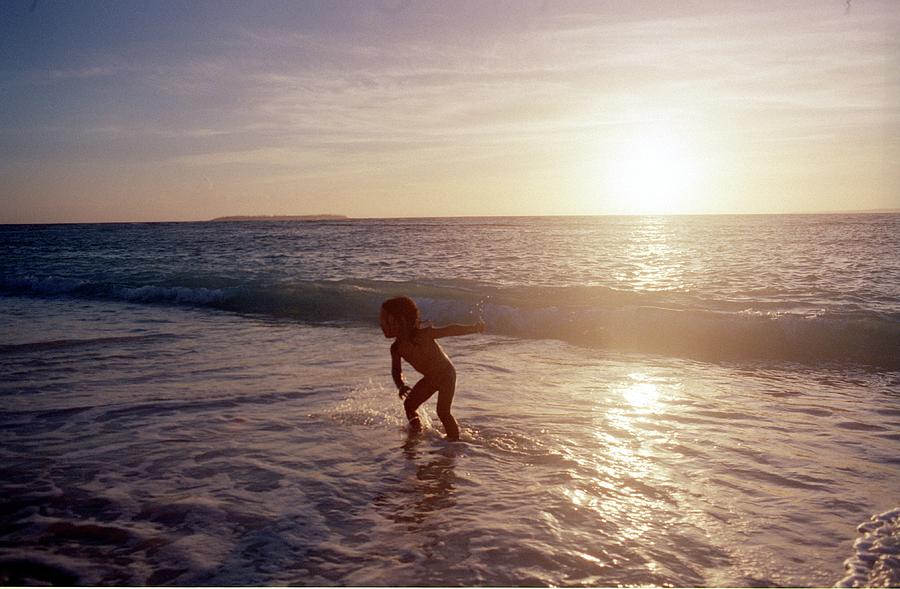 Boy Who Play On The Beach Photograph by Gen Umekita