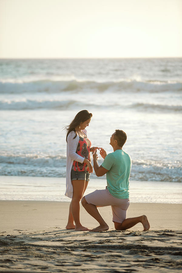 Boyfriend Proposing Marriage To Girlfriend While Kneeling At Beach ...