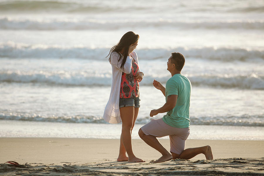 Boyfriend Proposing Marriage To Girlfriend While Kneeling At Beach ...