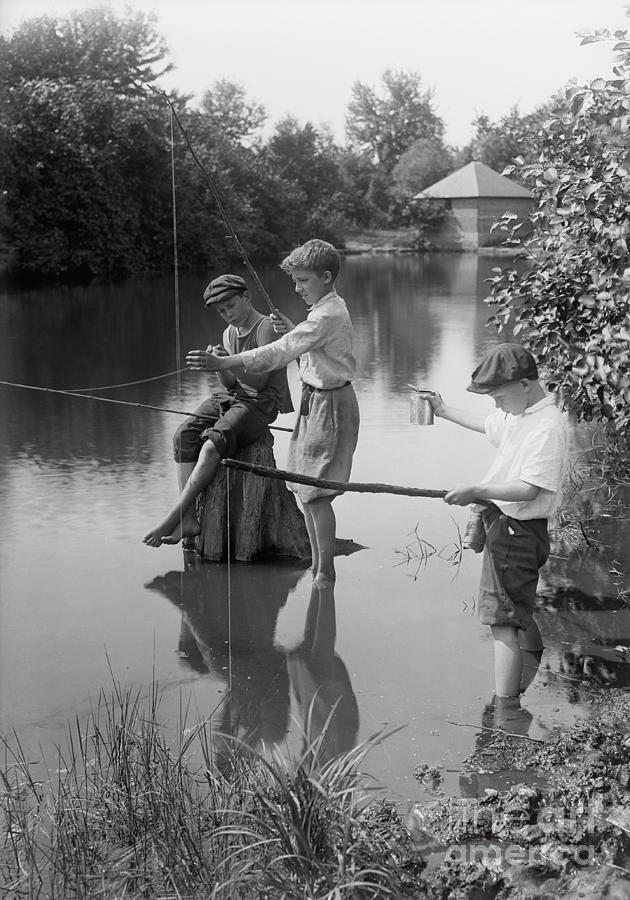 Boys 10-12 Years Fishing In River by Bettmann