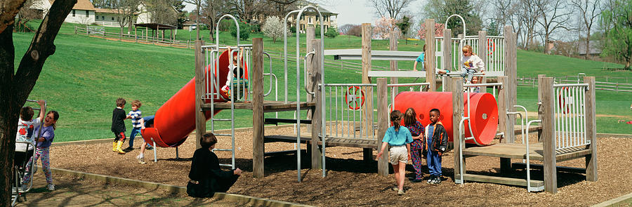 Boys And Girls Playing In A Playground Photograph by Panoramic Images