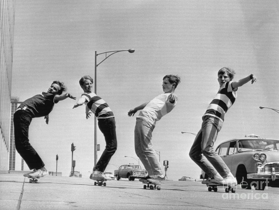 Boys Balancing On Their Skateboards Photograph by Bettmann