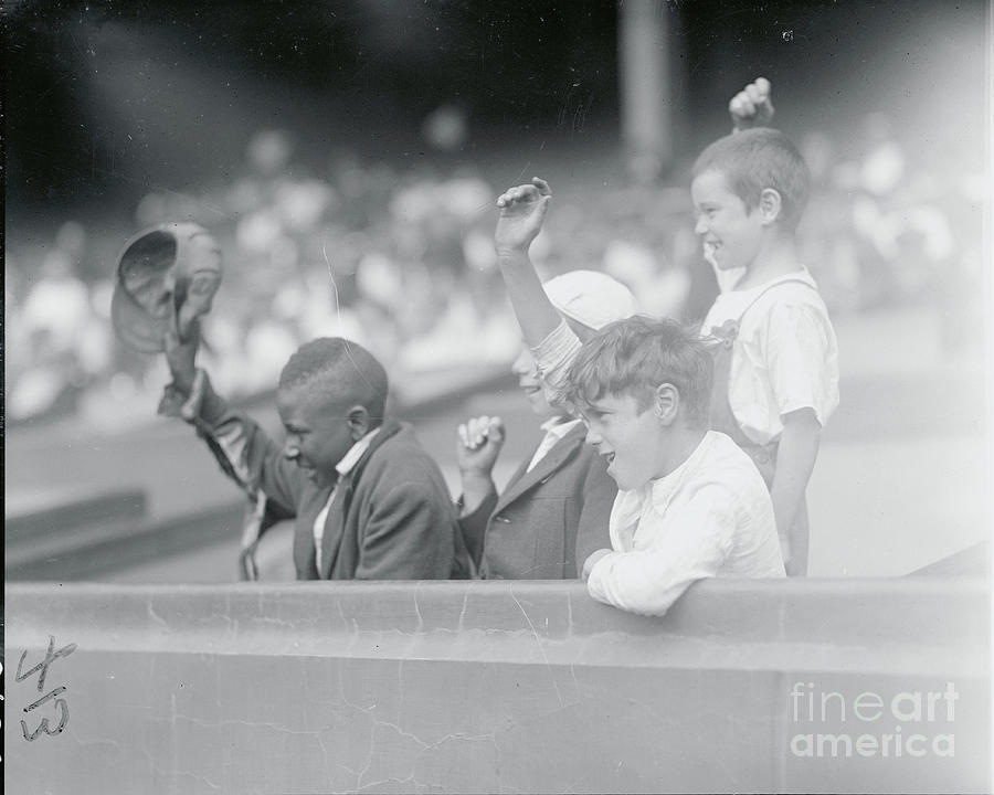 Boys Cheering In Stands Photograph by Bettmann