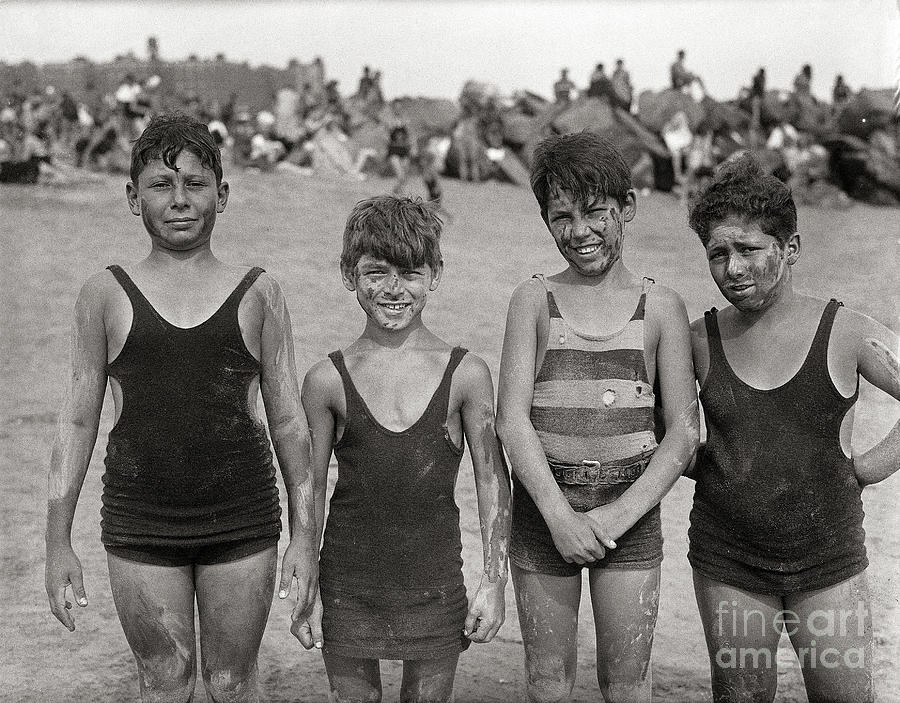 Boys Stand Smeared With Clay On Beach Photograph by Bettmann