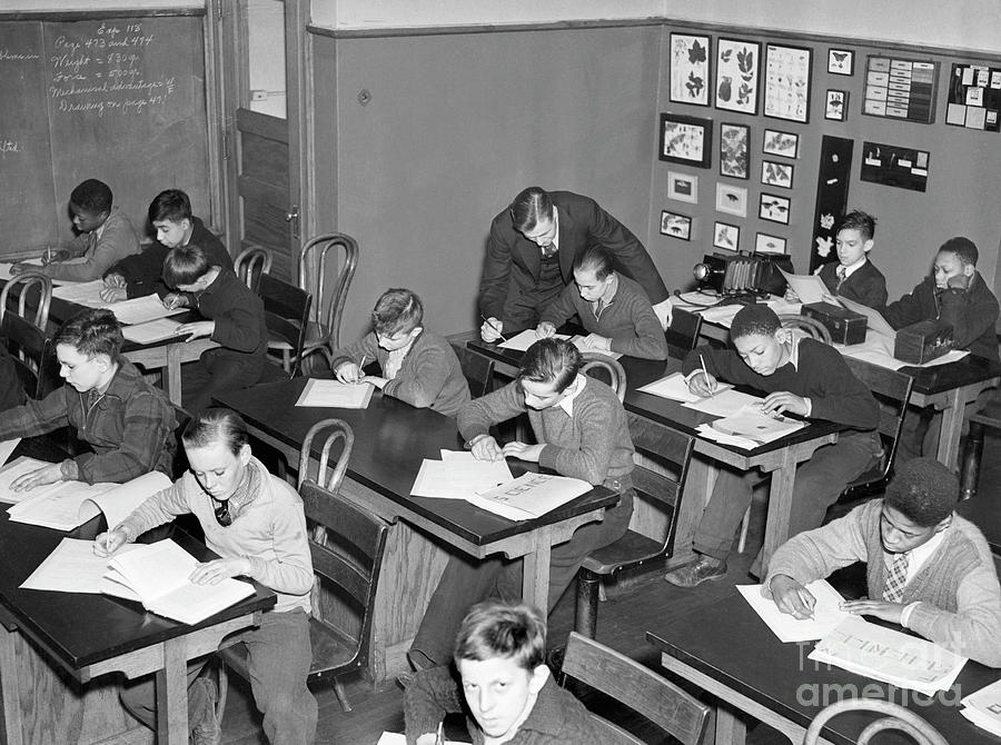 Boys Working In School Classroom Photograph by Bettmann