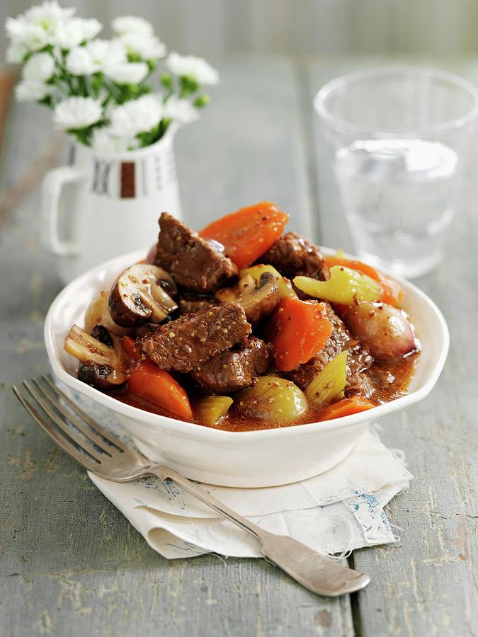 Braised Beef With Mushrooms, Vegetables And Ale Photograph by Gareth Morgans