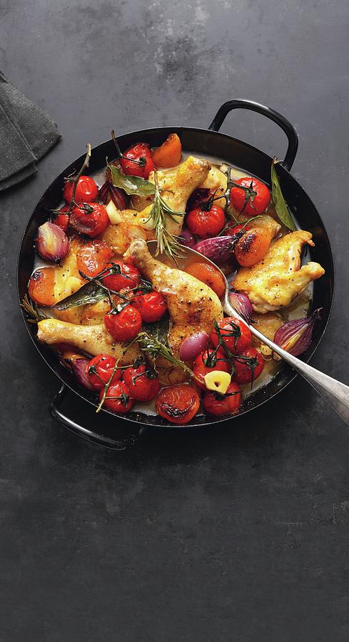 Braised Chicken With Vine Tomatoes, Apricots And Saffron Photograph by Jalag / Mathias Neubauer