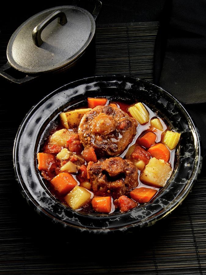 Braised Ox Tails With Root Vegetables And Celery Photograph by Paul Poplis