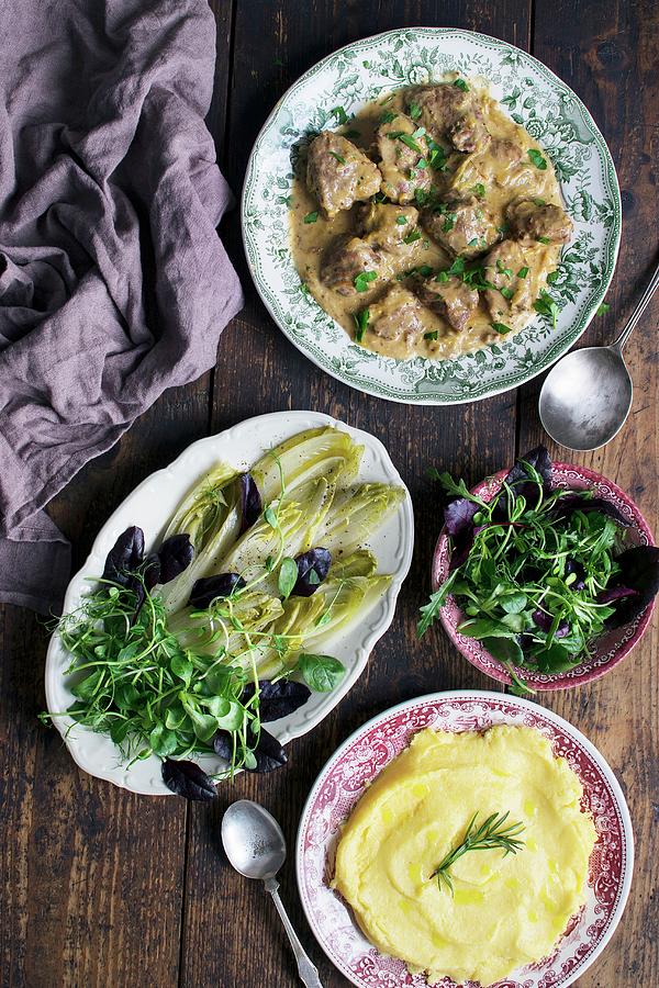 Braised Pig Cheeks, Braised Chokory, Fresh Salads Mix, Polenta Photograph by Justina Ramanauskiene