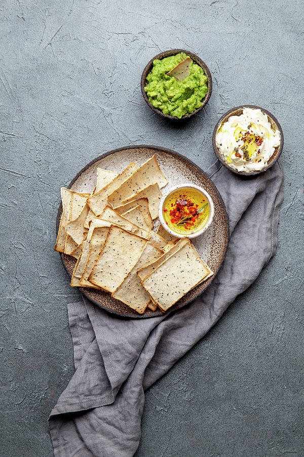 Bran Chips, Avocado Guacamole, Olive Oil With Spices, Cream Cheese Photograph by Larisa Blinova