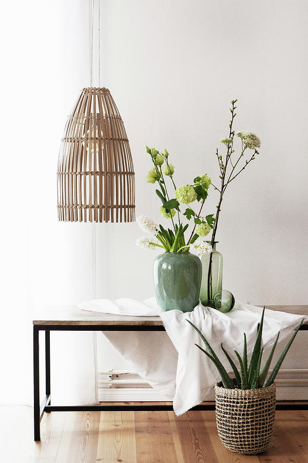 Branches Of Viburnum And Hyacinths On Coffee Table Below Pendant Lamps Photograph by Hej.hem Interior
