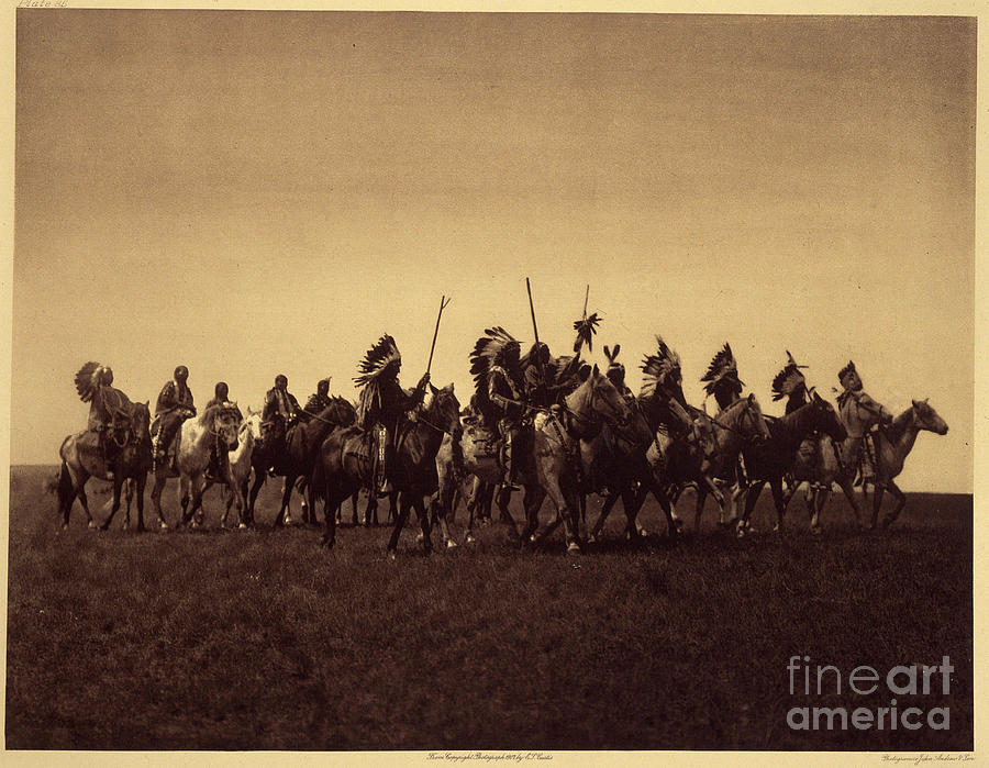 Brate War Party. A Band Of Sioux Brules Replays A Raid Against The Enemy. Photo Taken From Volume 3 Of Edward S. Curtiss Encyclopedia Photograph by Edward Sheriff Curtis