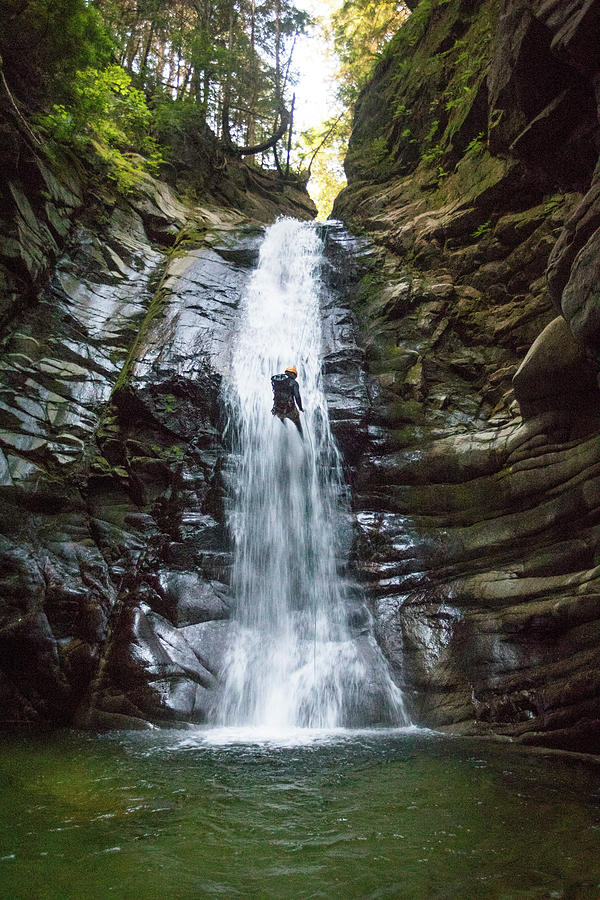 Brave Man Rappelling Down Waterfall In Cypress Canyon. Photograph by ...