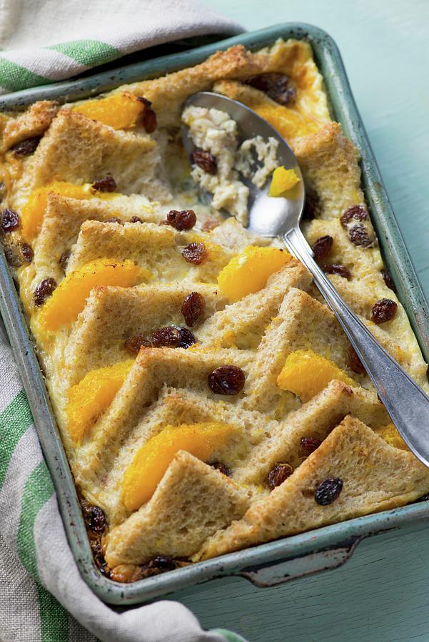 Bread And Butter Pudding With Oranges And Raisins Photograph by Jonathan Short