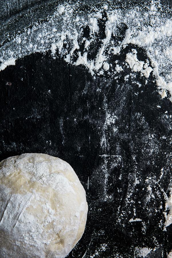 Bread Dough On A Floured Work Surface Photograph by Magdalena Hendey