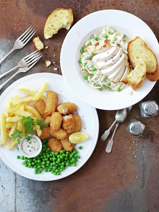 Breaded Scampi With Chips And Peas, And Ribbon Pasta With Chicken And Peas Photograph by Garlick, Ian