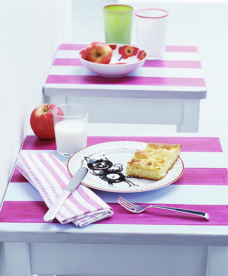 Breakfast Arranges On Stools With Pink-striped Tops Used As Childrens Tables Photograph by Matteo Manduzio