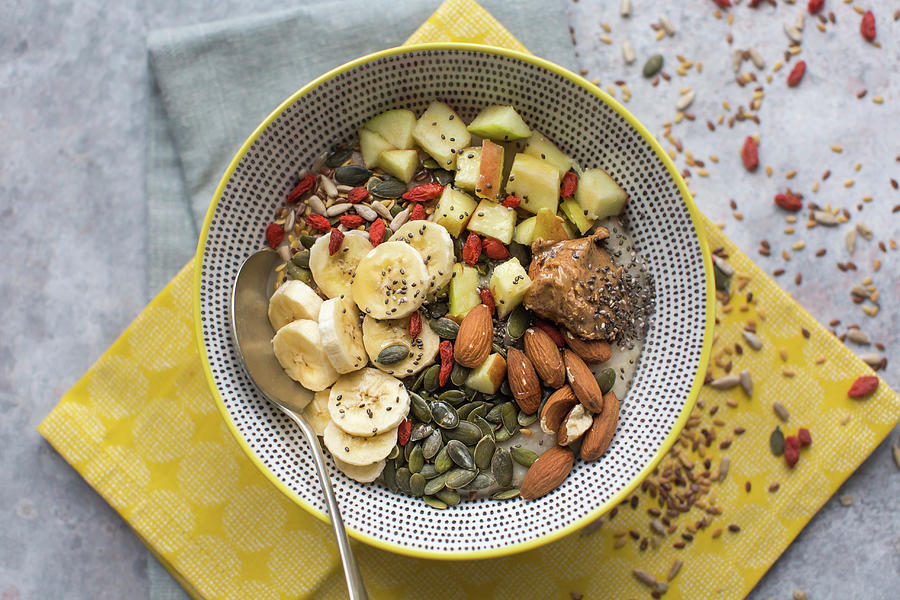Breakfast Bowl Of Porridge With Lots Of Toppings Photograph by Lara Jane Thorpe