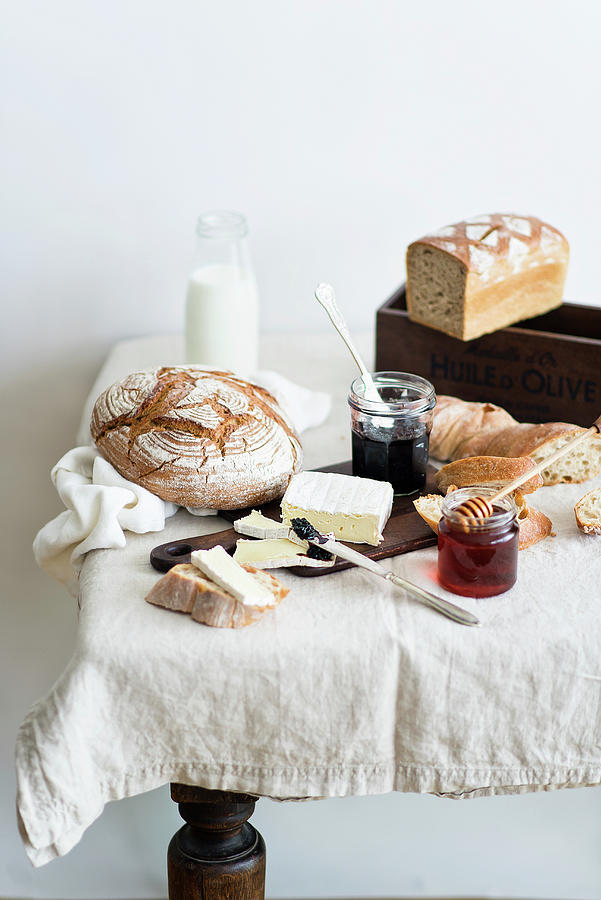 Breakfast - Different Types Of Bread With Butter, Cheese And Jam Photograph by Karolina Polkowska