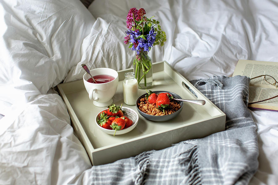 Breakfast In Bed With Fruit Tea, Granola, Milk And Strawberries Photograph by Lara Jane Thorpe