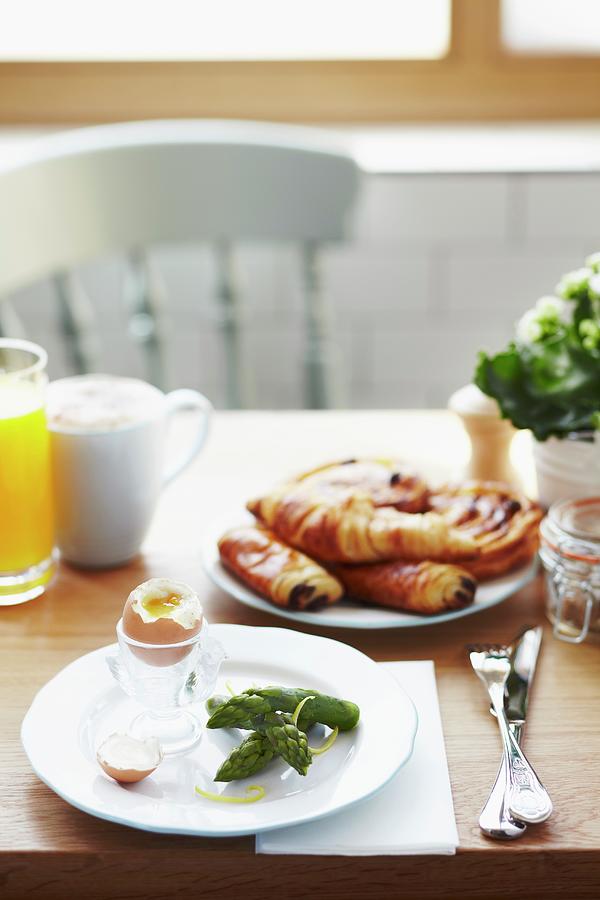 Breakfast Of Asparagus Tips, A Soft Boiled Egg, Pain Au Chocolat, Danish Pastry, Orange Juice And Coffee Photograph by Charlotte Tolhurst