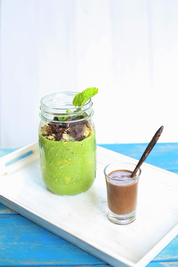 Breakfast Parfait With Pumpkin Seed Milk And Cocoa Nibs With Chocolate Sauce Photograph by Elle Brooks