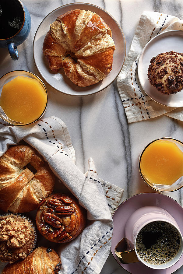 Breakfast Pastries, Orange Juice, And Coffee Photograph by Fred + Elliott  Photography
