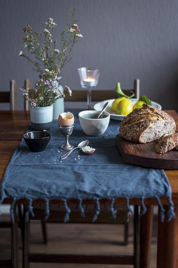 Breakfast Table With Bread, Egg And Lemons Photograph by Eva Lambooij