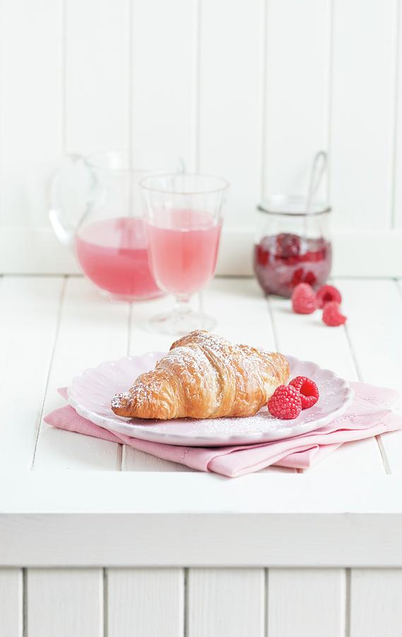 Breakfast With A Croissant, Raspberries, Juice And Raspberry Jam Photograph by Fotografie-lucie-eisenmann