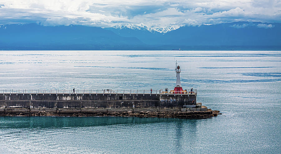 Breakwater and lighthouse in Victoria, BC Photograph by Darryl Brooks