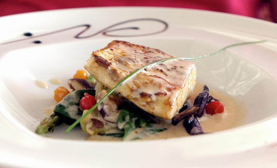 Bream Fillet On A Bed Of Vegetables With Beurre Blanc Photograph by Albert P Macdonald