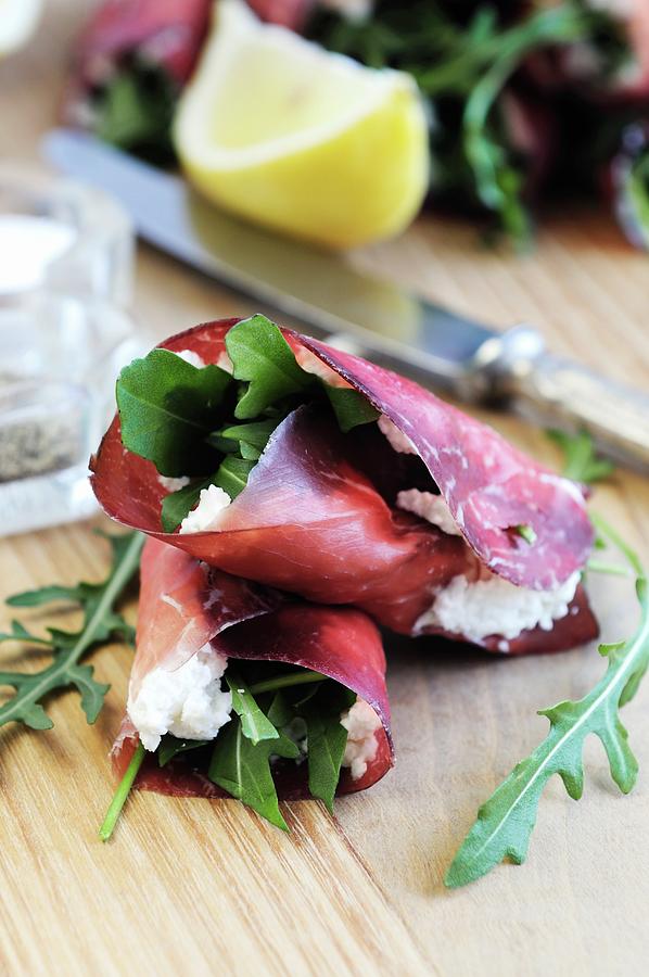 Bresaola beef Ham Rolls Filled With Ricotta And Rocket Photograph by Mario Matassa