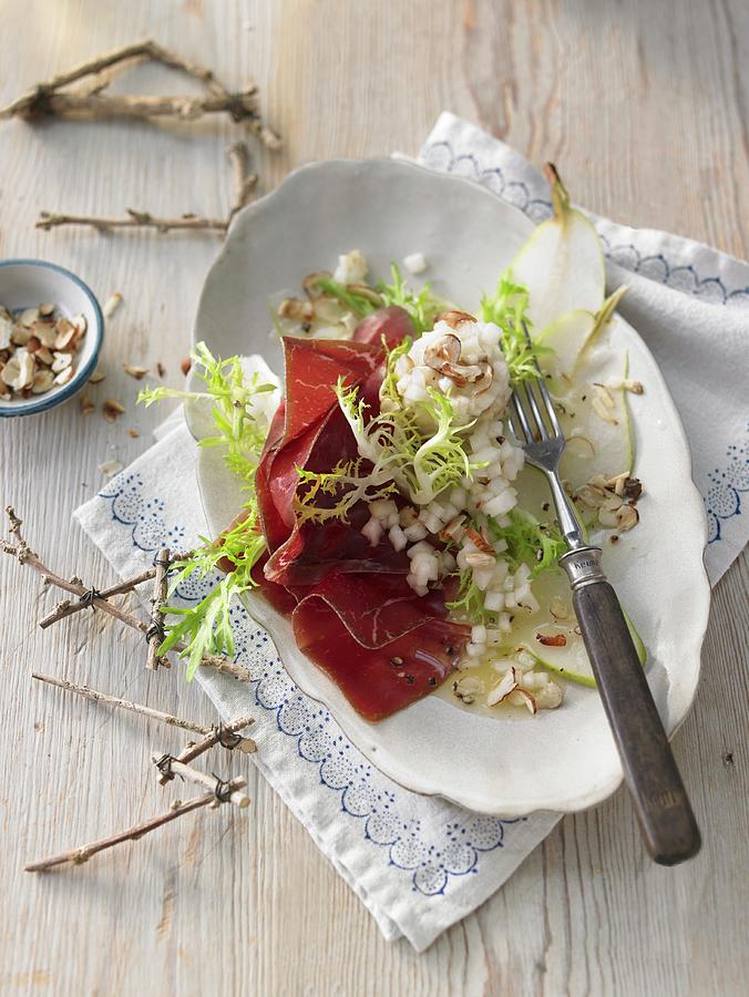 Bresaola With Pear And Nut Tartar On Rocket switzerland Photograph by Jan-peter Westermann