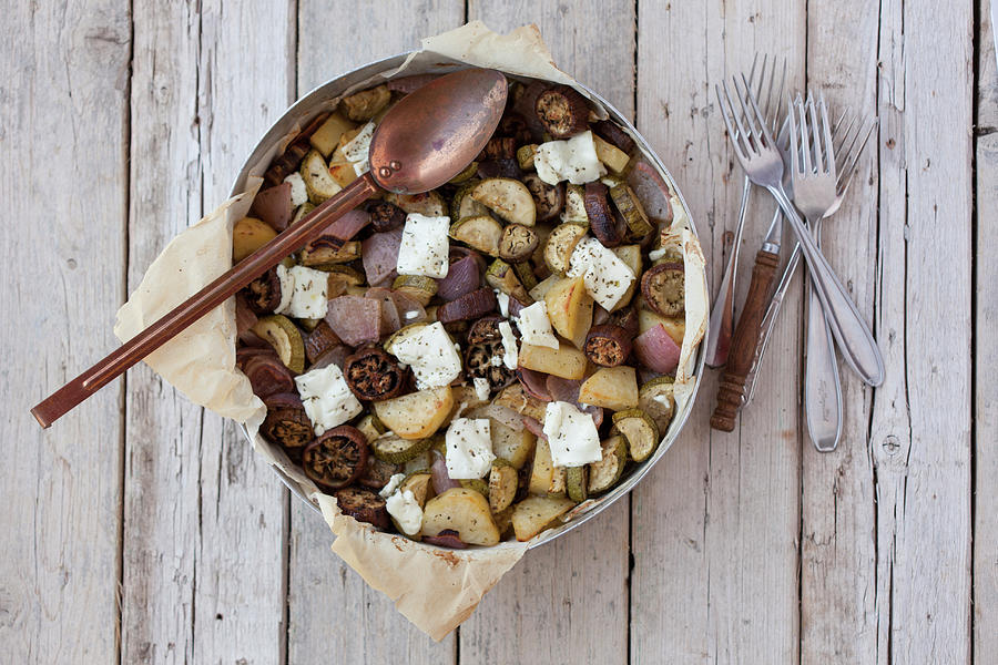 Briam potato Casserole, Greece With Zucchini, Tomatoes, Oregano And Feta Photograph by Adolforuizmaeso