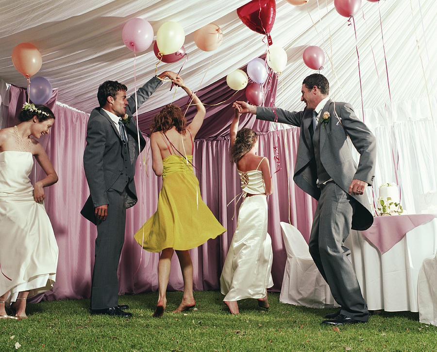 Bridal Party Dancing In Marquee Photograph by Devon Strong