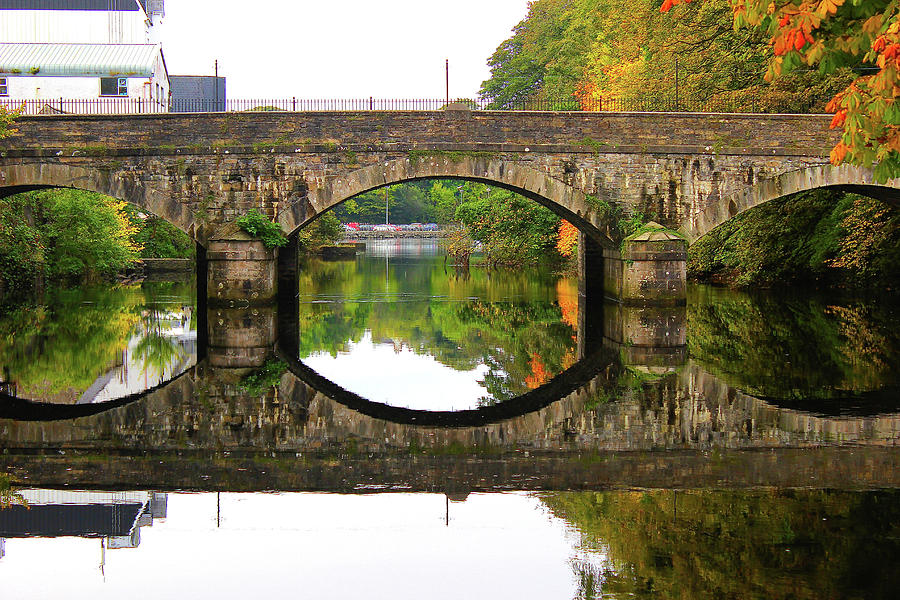 Bridge and reflection over River Eske in Donegal Ireland Photograph by Toni and Rene Maggio