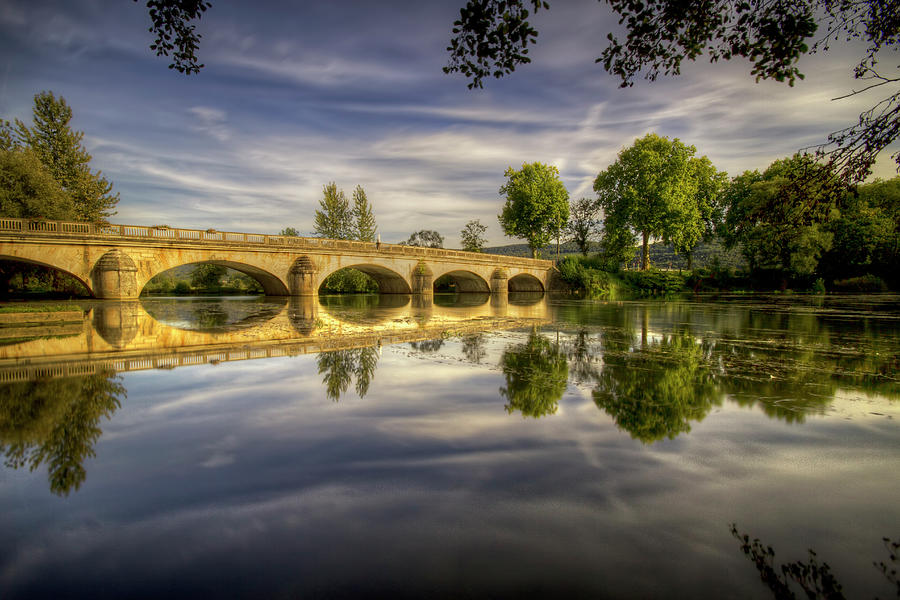 Bridge And Sky Reflection In River Photograph by Philippe Saire - Photography