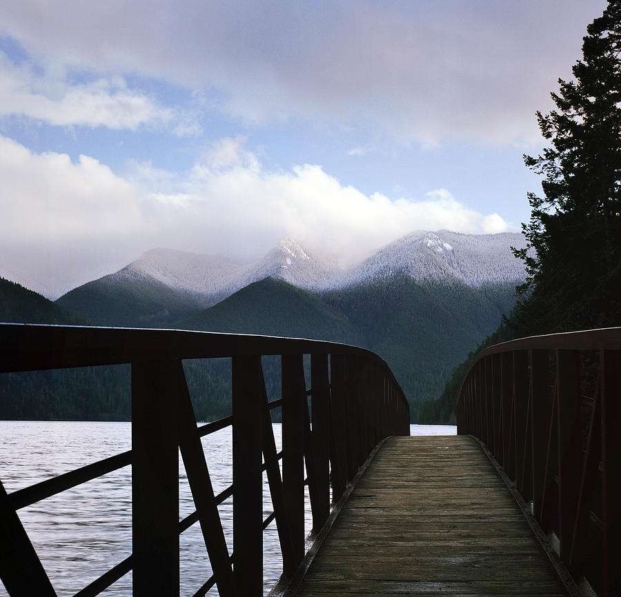 Bridge Crossing Near Lake And Mountains Photograph by Danielle D. Hughson