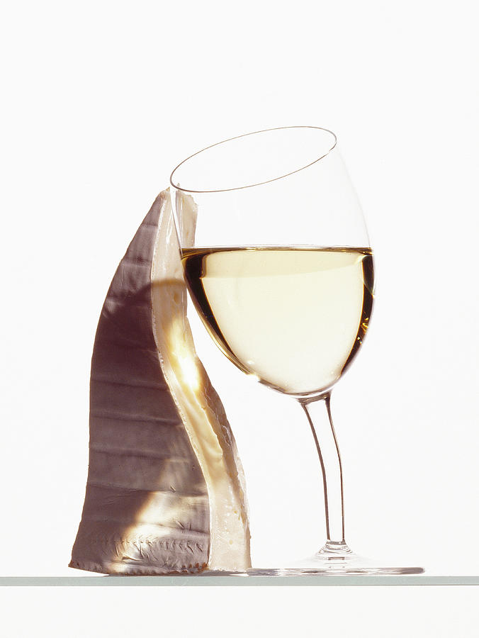 Brie With Glass Of White Wine Cuddling Photograph by Jonathan Pollock
