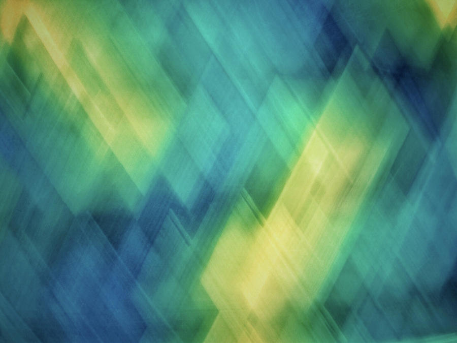 Bright blue, turquoise, green and yellow blurred diagonal and diamond shapes Photograph by Teri Virbickis