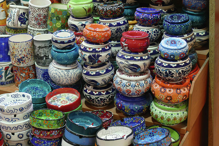 Bright colored enamel bowls in  Grand Bazaar Photograph by Steve Estvanik