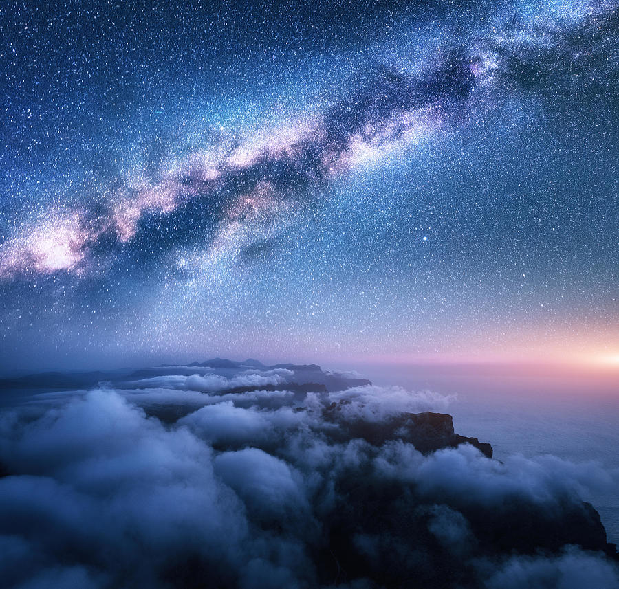 Landscape Photograph - Bright Milky Way Over The Low Clouds by Denys Bilytskyi