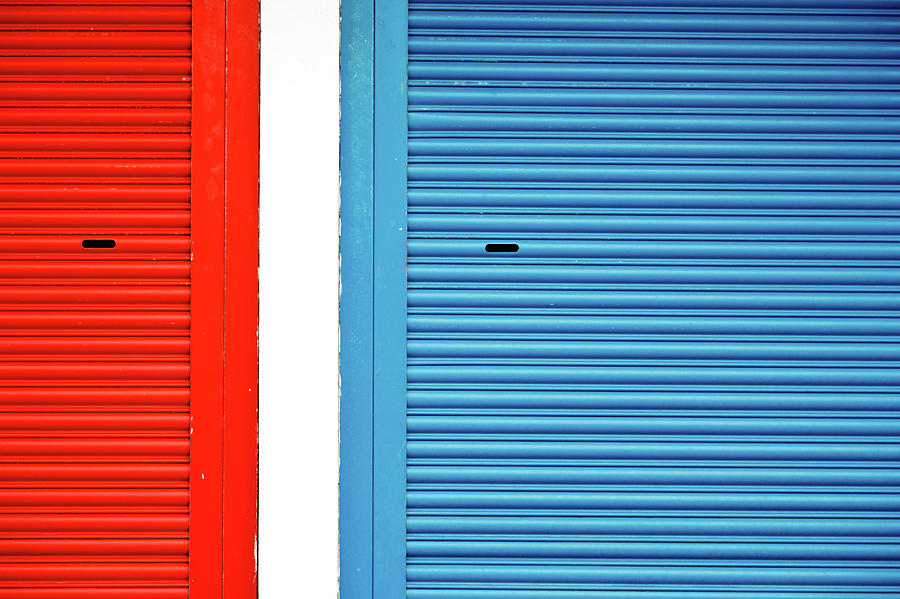 Bright Red And Blue Roller Shutters Photograph by M. Ivkovic - Bangphoto.co.uk