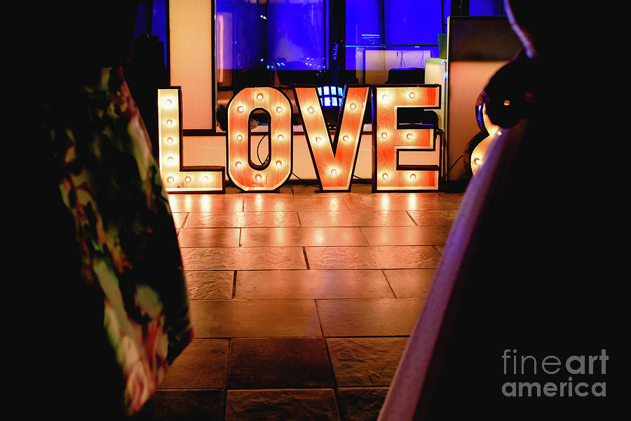 Bright wooden letters with word Love in a party Photograph by Joaquin Corbalan