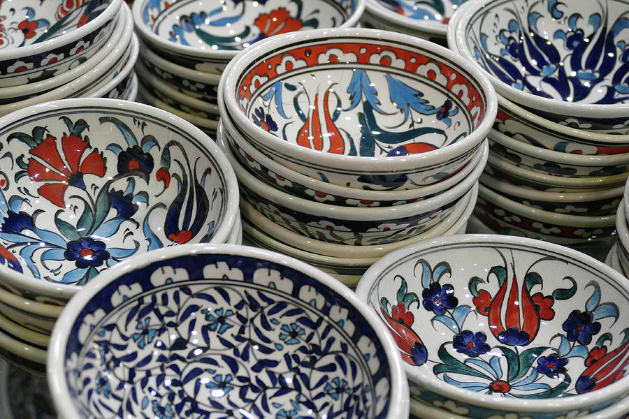 Brightly colored porcelain dishes from pottery factory  Photograph by Steve Estvanik