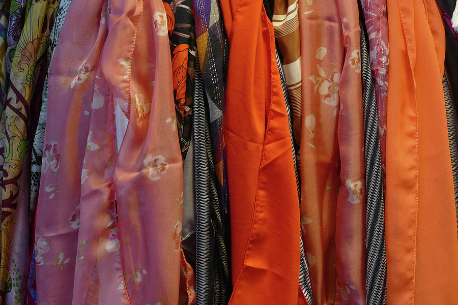 Brightly colored scarfs and veils  in the  Silk bazaar Photograph by Steve Estvanik