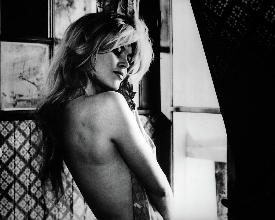 Black And White Photograph - Brigitte Bardot In Window Light by Globe Photos