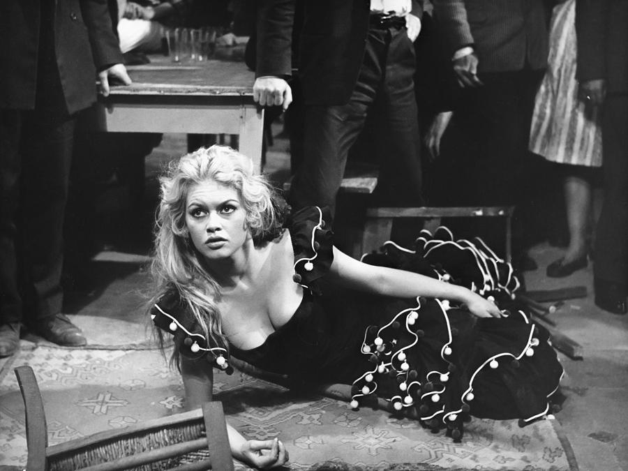 Movie Photograph - Brigitte Bardot: Sultry Expression Lying On Floor by Globe Photos